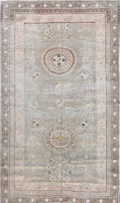 A Matt Camron faded antique Khotan