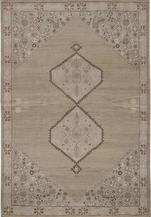 Above is another antique inspired oushak from our own line. The soft grays and tans are so trendy right now!