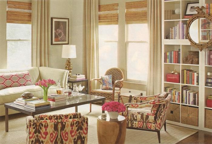 Meg's beautiful living room. I love the Ikat chair fabric- which is Lee Jofa. She pairs these chairs with a baker sofa and adds custom seagrass and custom drapes. The iron coffee table is from Heights Antiques on Yale.