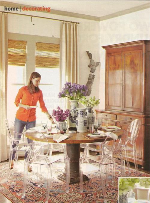 In Meg's dining room, she uses a beautiful Matt Camron Antique Heriz. The antique armoire is French from the 19th century. The dining table top is made from reclaimed cypress.