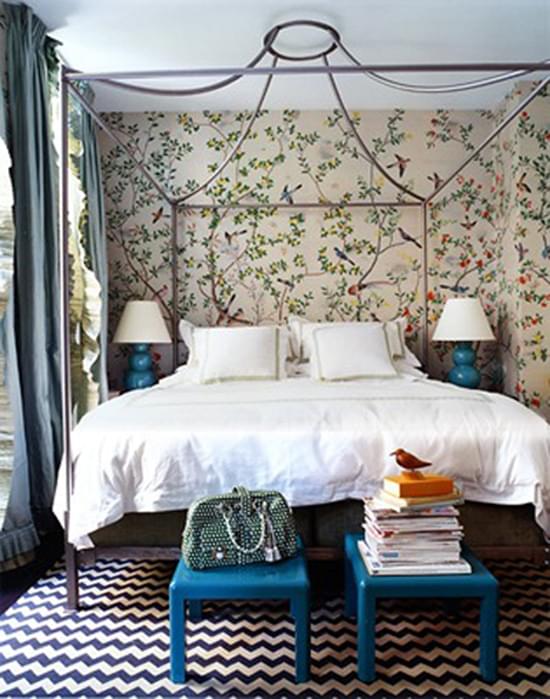 In this bedroom, he uses a blue and white flat-weave rug.