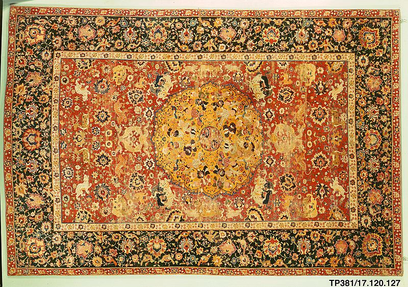 Beautiful, detailed 16th century rug from Tabriz with images that may depict the bazm: the feast that followed a battle.